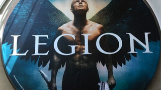 Legion's Shirtless Tatooed Angel Wields Both A Gun And A Knife